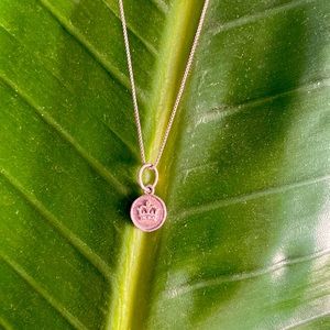 Silver queen and crown necklace